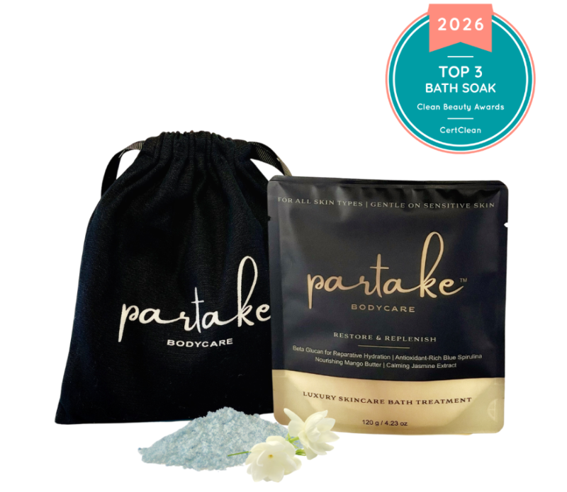 Partake Bodycare The Skincare Soak bath soak package with black drawstring bag and packaging on a white background